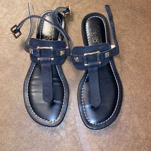 Black and gold sandals